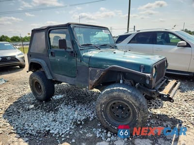Czwarte zdjęcie samochodu z boku: 2000 JEEP WRANGLER / TJ SPORT VIN:1J4FA49S7YP712148 - miniatura