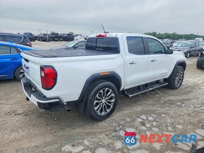 Trzecie zdjęcie samochodu z tyłu: 2024 GMC CANYON DENALI VIN:1GTP6FEK8R1196710 - miniatura