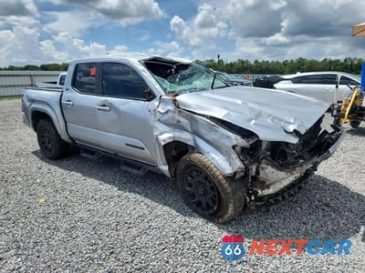 Czwarte zdjęcie samochodu z boku: 2024 TOYOTA TACOMA SR5 VIN:3TMKB5FN5RM023559 - miniatura