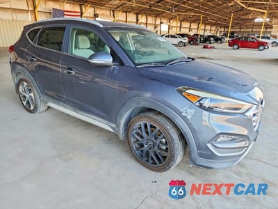 Czwarte zdjęcie samochodu z boku: 2017 HYUNDAI TUCSON VIN:KM8J33A24HU524295 - miniatura