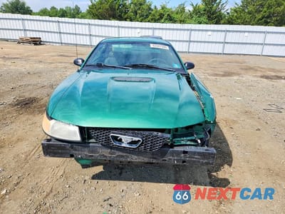 Piąte zdjęcie samochodu w środku: 2000 FORD MUSTANG VIN:1FAFP4041YF247106 - miniatura