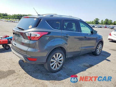 Trzecie zdjęcie samochodu z tyłu: 2017 FORD ESCAPE TITANIUM VIN:1FMCU9J94HUD90684 - miniatura