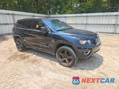 Czwarte zdjęcie samochodu z boku: 2015 JEEP GRAND CHEROKEE LAREDO VIN:1C4RJEAG6FC152918 - miniatura