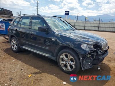 Czwarte zdjęcie samochodu z boku: 2011 BMW X5 XDRIVE35D VIN:5UXZW0C58BL660638 - miniatura