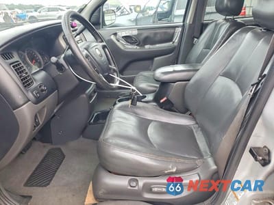 Zdjęcie 7 z 13 samochodu: 2004 MAZDA TRIBUTE ES VIN:4F2CZ96194KM12807 - miniatura