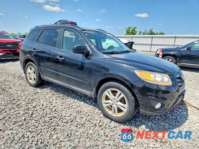 Czwarte zdjęcie samochodu z boku: 2011 HYUNDAI SANTA FE LIMITED VIN:5XYZKDAG3BG048044 - miniatura