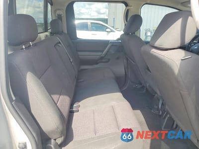 Zdjęcie 10 z 13 samochodu: 2010 NISSAN TITAN XE VIN:1N6BA0EK0AN325071 - miniatura
