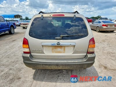 Zdjęcie 6 z 13 samochodu: 2001 MAZDA TRIBUTE LX VIN:4F2YU091X1KM60985 - miniatura