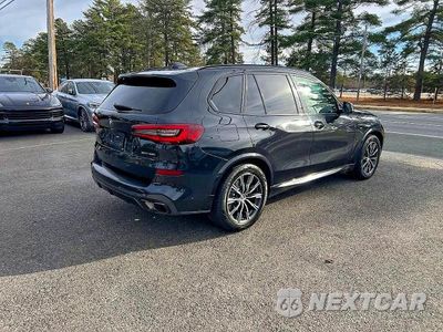 Czwarte zdjęcie samochodu z boku: 2021 BMW X5 XDRIVE40I VIN:5UXCR6C04M9G98133 - miniatura