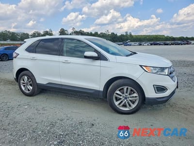 Czwarte zdjęcie samochodu z boku: 2015 FORD EDGE SEL VIN:2FMTK4J80FBB17065 - miniatura