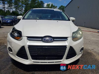 Piąte zdjęcie samochodu w środku: 2013 FORD FOCUS TITANIUM VIN:1FADP3N23DL141969 - miniatura