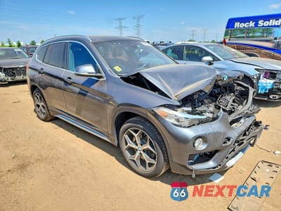 Czwarte zdjęcie samochodu z boku: 2019 BMW X1 XDRIVE28I VIN:WBXHT3C54K5L35502 - miniatura