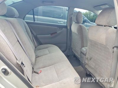 Zdjęcie 10 z 12 samochodu: 2003 TOYOTA COROLLA LE VIN:JTDBR32E230011868 - miniatura
