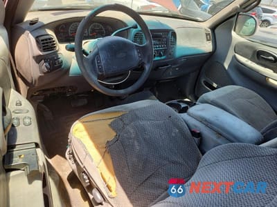 Zdjęcie 8 z 12 samochodu: 1999 FORD F150 VIN:1FTRX17L6XKA54166 - miniatura