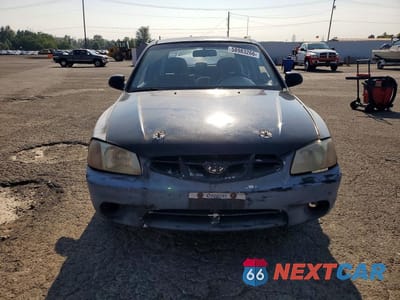 Piąte zdjęcie samochodu w środku: 2000 HYUNDAI ACCENT L VIN:KMHCF35G7YU039171 - miniatura