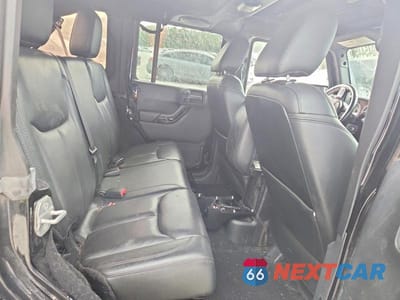Zdjęcie 10 z 12 samochodu: 2014 JEEP WRANGLER UNLIMITED SAHARA VIN:1C4BJWEG5EL283533 - miniatura