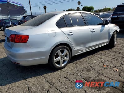 Trzecie zdjęcie samochodu z tyłu: 2012 VOLKSWAGEN JETTA BASE VIN:3VW2K7AJ5CM353352 - miniatura
