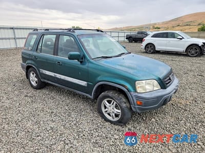 Czwarte zdjęcie samochodu z boku: 1999 HONDA CR-V EX VIN:JHLRD1863XC020619 - miniatura