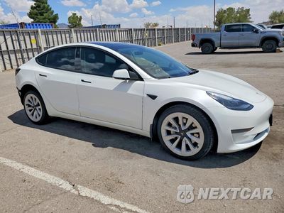 Czwarte zdjęcie samochodu z boku: 2023 TESLA MODEL 3 VIN:5YJ3E1EA6PF473550 - miniatura