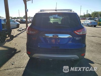 Zdjęcie 6 z 12 samochodu: 2016 FORD ESCAPE TITANIUM VIN:1FMCU9JX0GUA55192 - miniatura