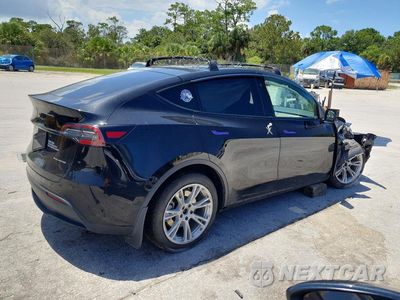 Trzecie zdjęcie samochodu z tyłu: 2021 TESLA MODEL Y VIN:5YJYGDEE1MF190585 - miniatura