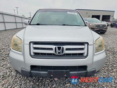 Piąte zdjęcie samochodu w środku: 2006 HONDA PILOT EX VIN:2HKYF18766H548346 - miniatura