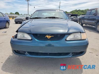 Piąte zdjęcie samochodu w środku: 1995 FORD MUSTANG GT VIN:1FALP45T8SF104129 - miniatura