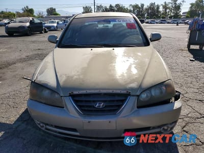 Piąte zdjęcie samochodu w środku: 2005 HYUNDAI ELANTRA GLS VIN:KMHDN46D95U955220 - miniatura