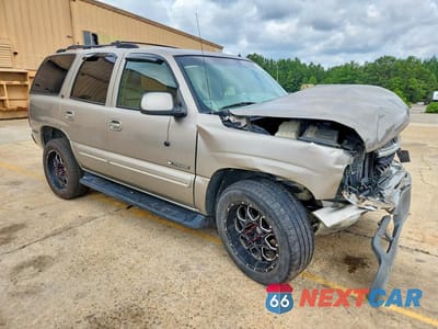 Czwarte zdjęcie samochodu z boku: 2002 CHEVROLET TAHOE VIN:1GNEK13Z42R236303 - miniatura
