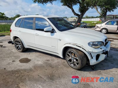 Czwarte zdjęcie samochodu z boku: 2012 BMW X5 XDRIVE50I VIN:5UXZV8C53CL423817 - miniatura