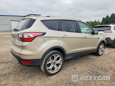 Trzecie zdjęcie samochodu z tyłu: 2017 FORD ESCAPE TITANIUM VIN:1FMCU0J90HUB86055 - miniatura