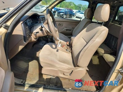 Zdjęcie 7 z 12 samochodu: 2002 TOYOTA TACOMA XTRACAB VIN:5TEWM72N62Z131999 - miniatura