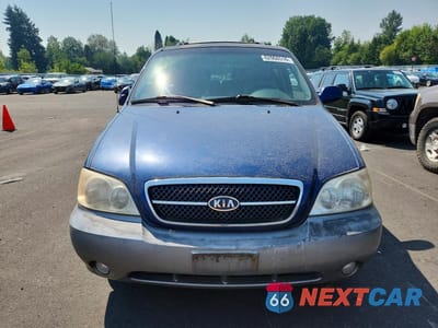 Piąte zdjęcie samochodu w środku: 2005 KIA SEDONA LX VIN:KNDUP131256662030 - miniatura