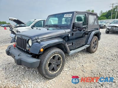 2012 JEEP WRANGLER SAHARA 1C4AJWBG7CL264706 - główne zdjęcie licytacji z USA - miniatura