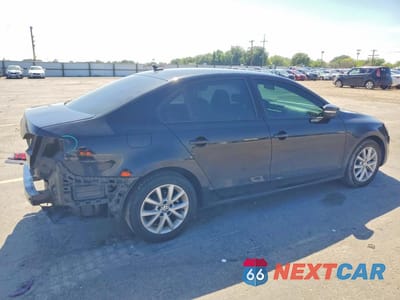 Trzecie zdjęcie samochodu z tyłu: 2012 VOLKSWAGEN JETTA VIN:3VWDP7AJ0CM427237 - miniatura