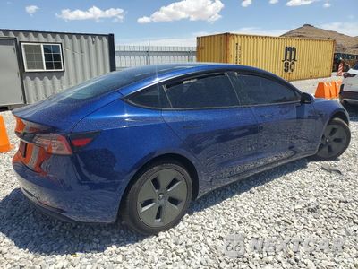 Trzecie zdjęcie samochodu z tyłu: 2023 TESLA MODEL 3 VIN:5YJ3E1EA5PF447019 - miniatura