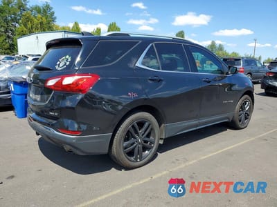 Trzecie zdjęcie samochodu z tyłu: 2020 CHEVROLET EQUINOX LT VIN:2GNAXVEX8L6194234 - miniatura