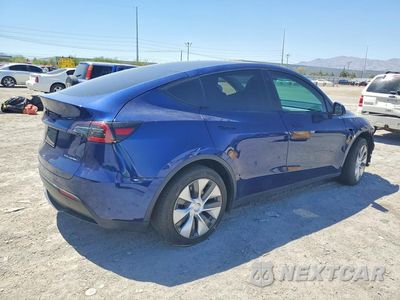 Trzecie zdjęcie samochodu z tyłu: 2022 TESLA MODEL Y VIN:7SAYGDEE9NF559505 - miniatura