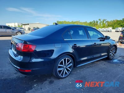 Trzecie zdjęcie samochodu z tyłu: 2012 VOLKSWAGEN JETTA GLI VIN:3VW567AJ3CM409628 - miniatura