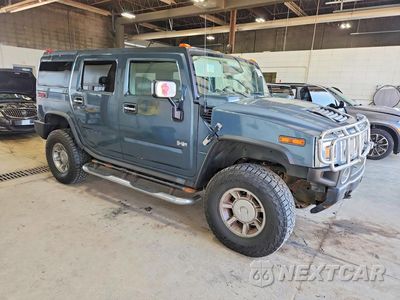 Czwarte zdjęcie samochodu z boku: 2005 HUMMER H2 VIN:5GRGN23U45H124158 - miniatura