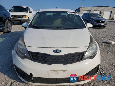 Piąte zdjęcie samochodu w środku: 2014 KIA RIO LX VIN:KNADM4A33E6328486 - miniatura