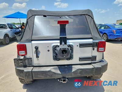 Zdjęcie 6 z 12 samochodu: 2010 JEEP WRANGLER SPORT VIN:1J4AA2D10AL167632 - miniatura