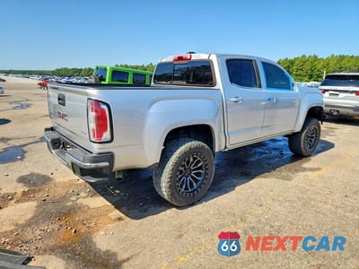 Trzecie zdjęcie samochodu z tyłu: 2018 GMC CANYON SLE VIN:1GTG5CEA1J1288769 - miniatura