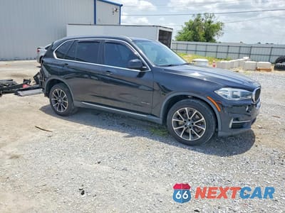 Czwarte zdjęcie samochodu z boku: 2016 BMW X5 SDRIVE35I VIN:5UXKR2C5XG0H42130 - miniatura