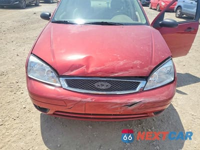Zdjęcie 11 z 12 samochodu: 2005 FORD FOCUS VIN:1FAFP34N25W304678 - miniatura