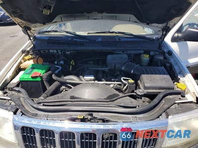Zdjęcie 12 z 13 samochodu: 2000 JEEP GRAND CHEROKEE LAREDO VIN:1J4GW48S6YC114132 - miniatura