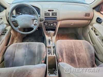 Zdjęcie 8 z 12 samochodu: 2002 TOYOTA COROLLA LE VIN:1NXBR12E52Z641648 - miniatura