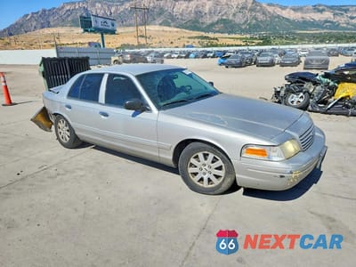Czwarte zdjęcie samochodu z boku: 2006 FORD CROWN VICTORIA LX VIN:2FAFP74W26X129158 - miniatura