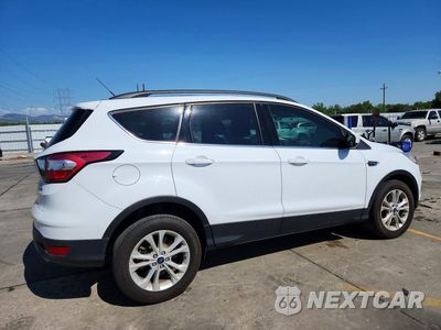 Trzecie zdjęcie samochodu z tyłu: 2017 FORD ESCAPE SE VIN:1FMCU9G90HUD53557 - miniatura