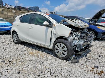 Czwarte zdjęcie samochodu z boku: 2014 TOYOTA PRIUS C TWO VIN:JTDKDTB34E1561907 - miniatura